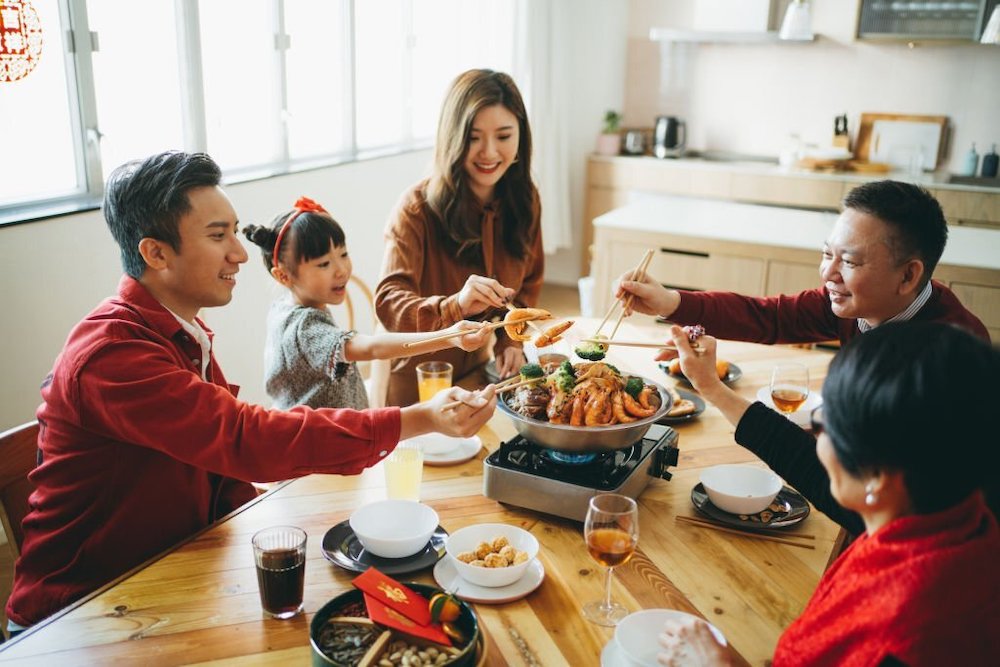 Asian family eating hotpot