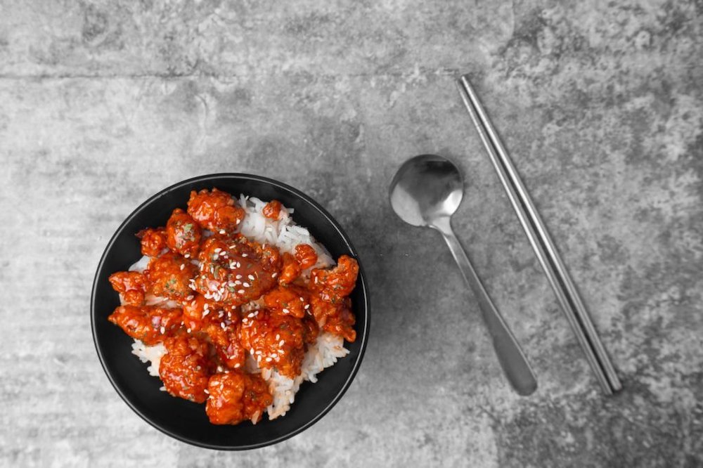Korean spicy crispy chicken on rice.